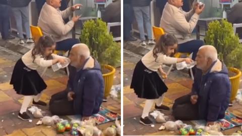 Η επιτομή της καλοσύνης: κοριτσάκι βοηθάει άστεγο παππούλη να πιει νερό