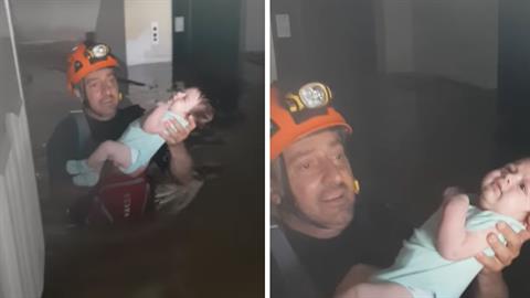 Η συγκλονιστική στιγμή που διασώστης σώζει νεογέννητο από πλημμυρισμένο σπίτι